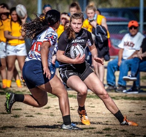 Girl plays rugby