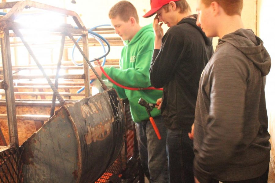 Students work on hoses