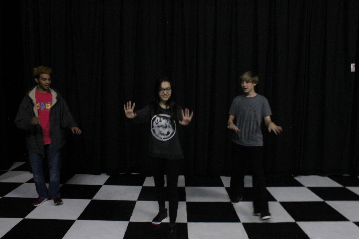 Students dancing on the stage. 