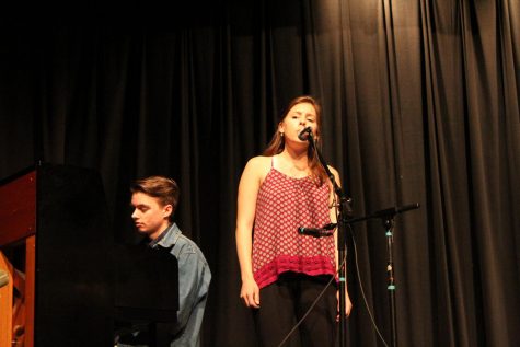 Abigail Rocicot performing 'Apart Of Your World' from The Little Mermaid. Accompanied by her older brother.