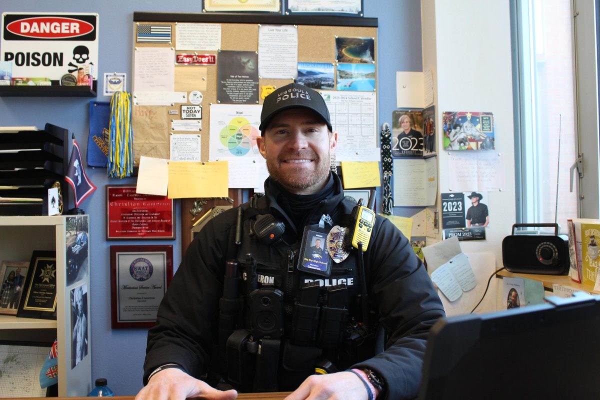 Christian Cameron, presiding school resource officer for Big Sky High School, sits in his office, January 2025. 