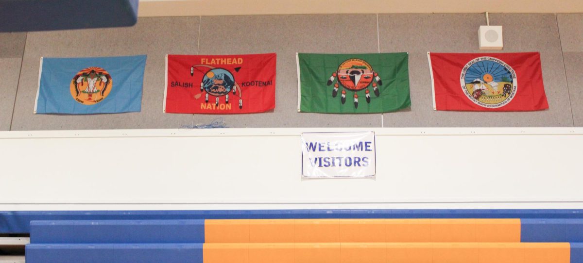 Montana tribal flags displayed in the main gym of Big Sky High School, January 2025. 