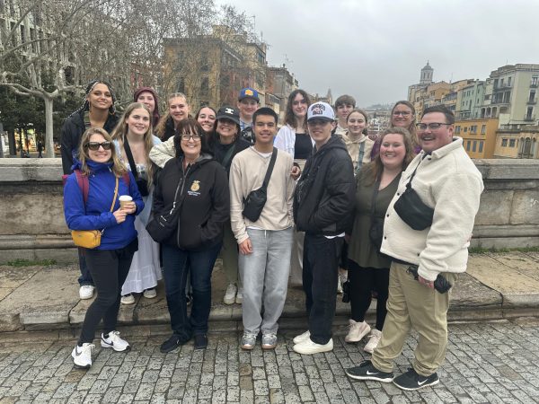 The Big Sky travel group stands for a photo with their tour director, Blanca, in Girona, Spain, March 2025. 
