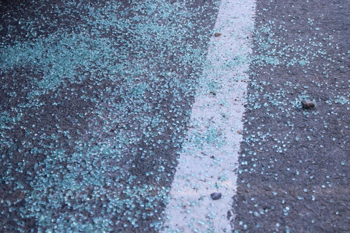 Shattered glass from the recent car break in at Big Sky High School in the parking lot, May 2025. 