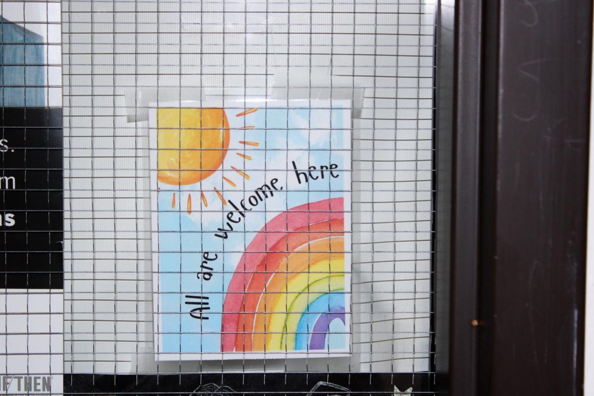 Photos of inclusive signs and pride flags on classroom doors and windows at Big Sky, June 2025. 
