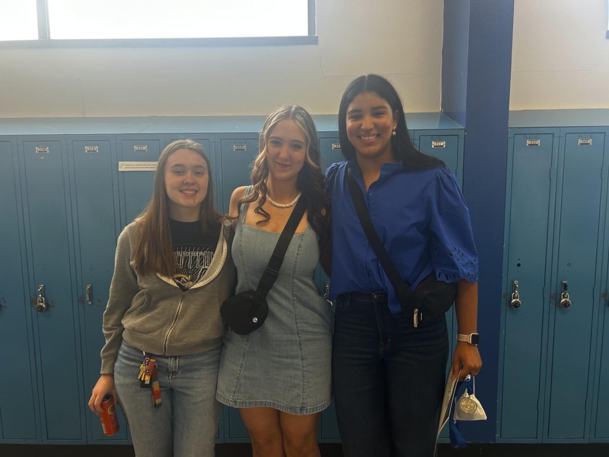 From left, Sara Buisson, Anaiya Tupeck, and Briana Machado stand for a photo. All three teens are Big Sky IB Diploma candidates and graduated high school on June 7, 2025. 