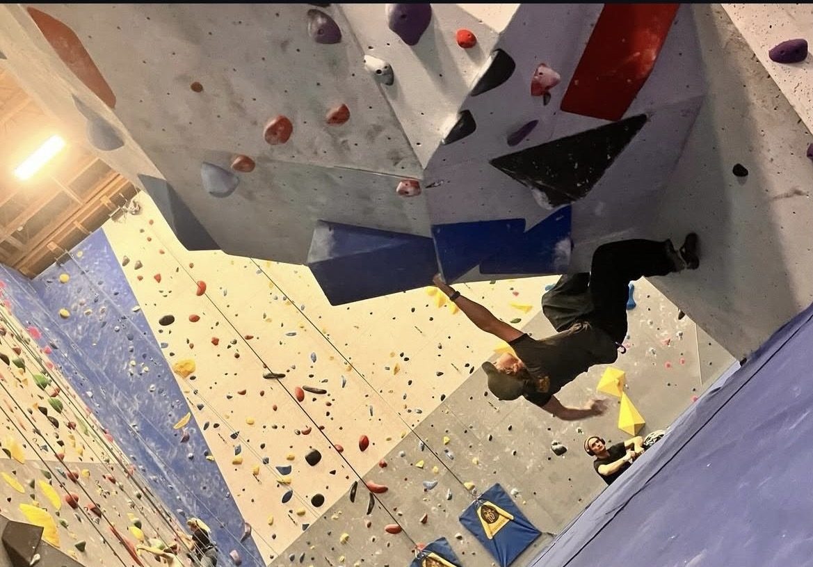 Hurleigh Pino, a sophomore at Hellgate High School, climbing an overhang route at Freestone climbing gym.