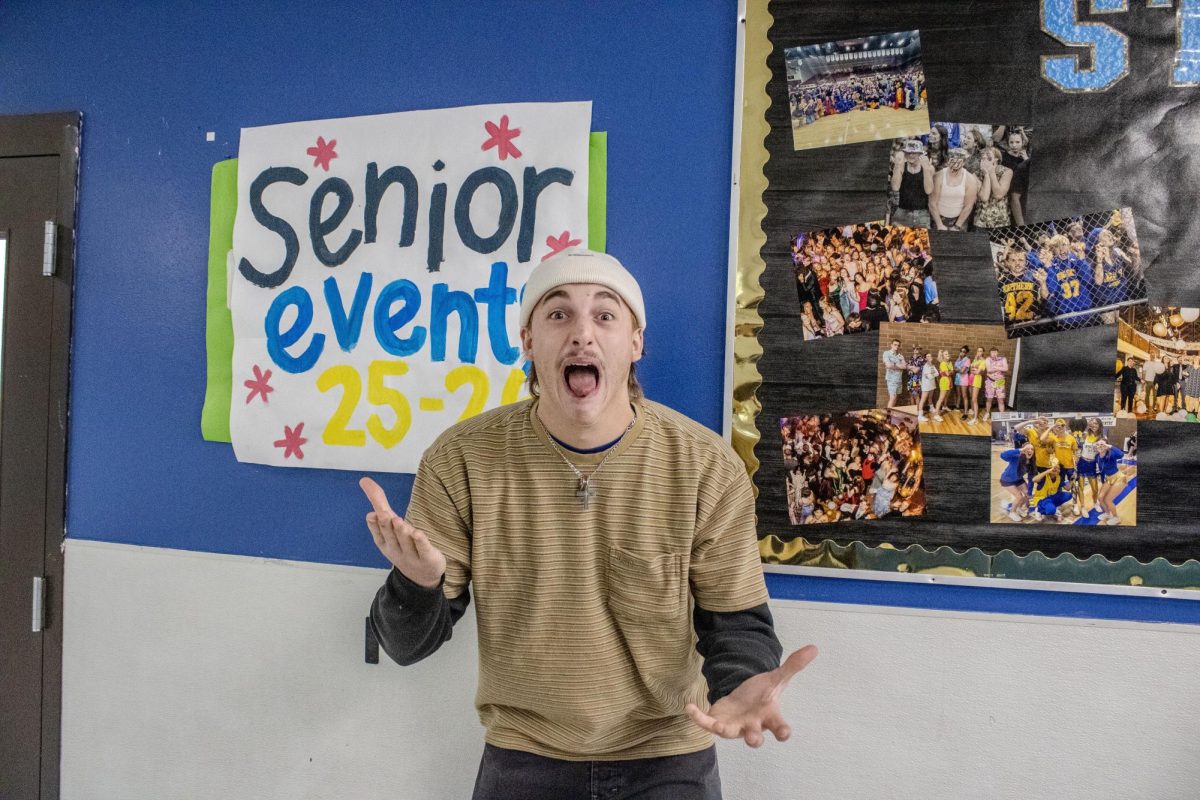 Big Sky junior Bo Morrison enthusiastically does the "67" hand motion. 