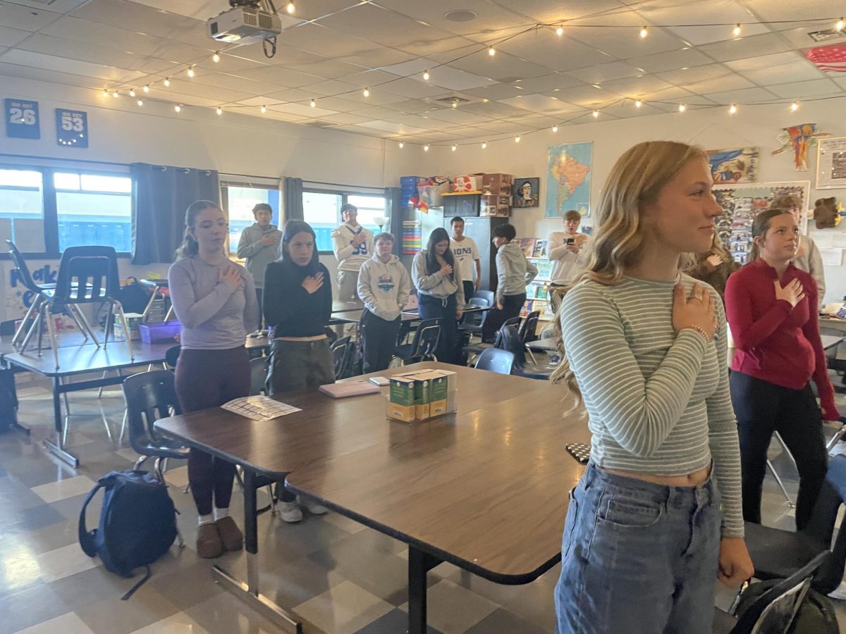 Big Sky students stand for the pledge of allegiance, fall 2025. 