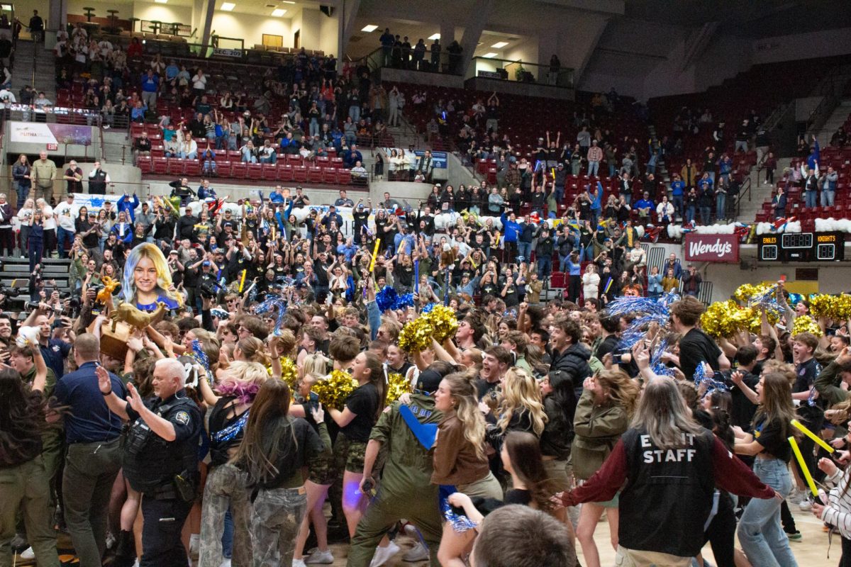 After hearing Big Sky had won the 7th annual GOAT game with a score of 472-469, students rushed to the court as and held “Gertie the Goat” up.