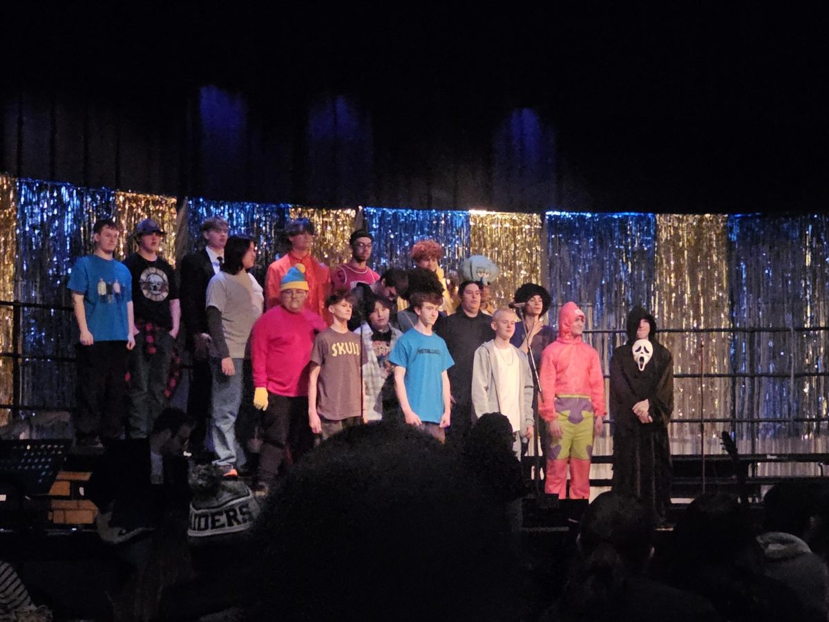 Big Sky's Tenor Bass Choir performing at the 2026 Cafe Chocolat: Back to the 90s show. 