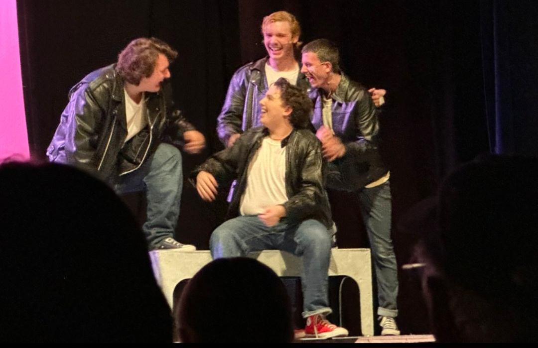 Andrew Ruzanski, Koehan Swearingen, Zach Everett, and Ari Manthie in character during Grease, March 2026. 